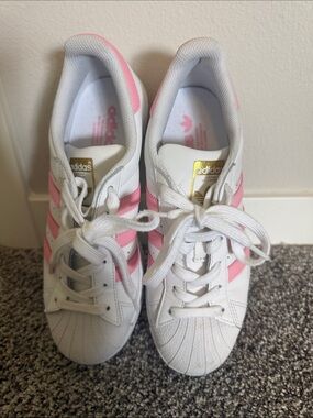 adidas White Sneakers with Pink Stripes and Gold Tongue Logo